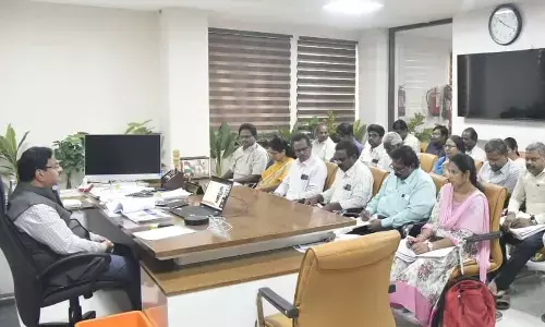 District Collector K Venkataramana Reddy speaking to the officials at a review meeting in Tirupati on Saturday