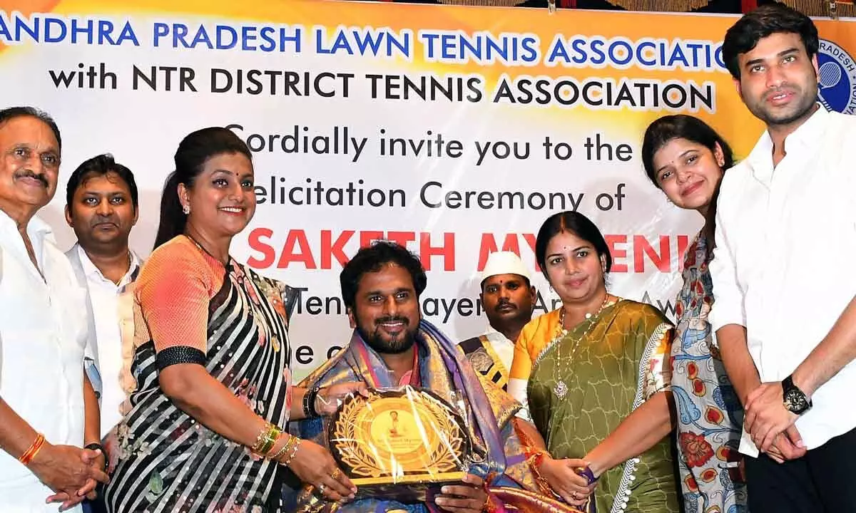 Minister RK Roja felicitating tennis player Saketh Myneni at PB Siddhartha Academy in Vijayawada on Sunday. Mayor Rarana Bhayalashmi, Devineni Avinash, former MP Gokarju Gangaraju, Dr K Pattabhi Ramaiah also seen.Photo: Ch Venkata Mastan