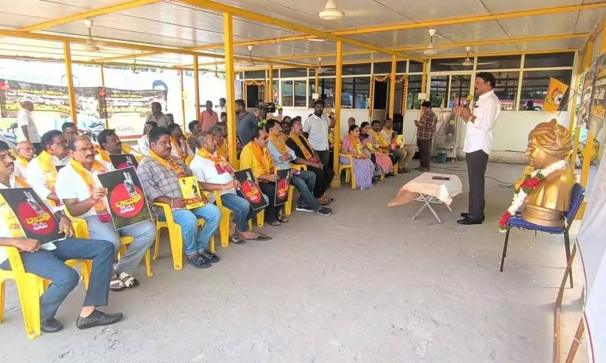 Vijayawada East MLA Gadde Rammohana Rao addressing TDP party leaders and activists at a protest in Vijayawada on Sunday