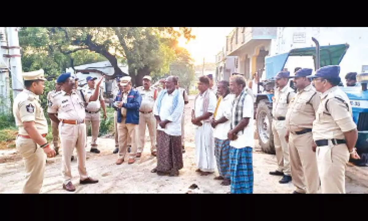 Superintendent of Police K K N Anburajan conducting visible policing in villages in Anantapur district on Sunday