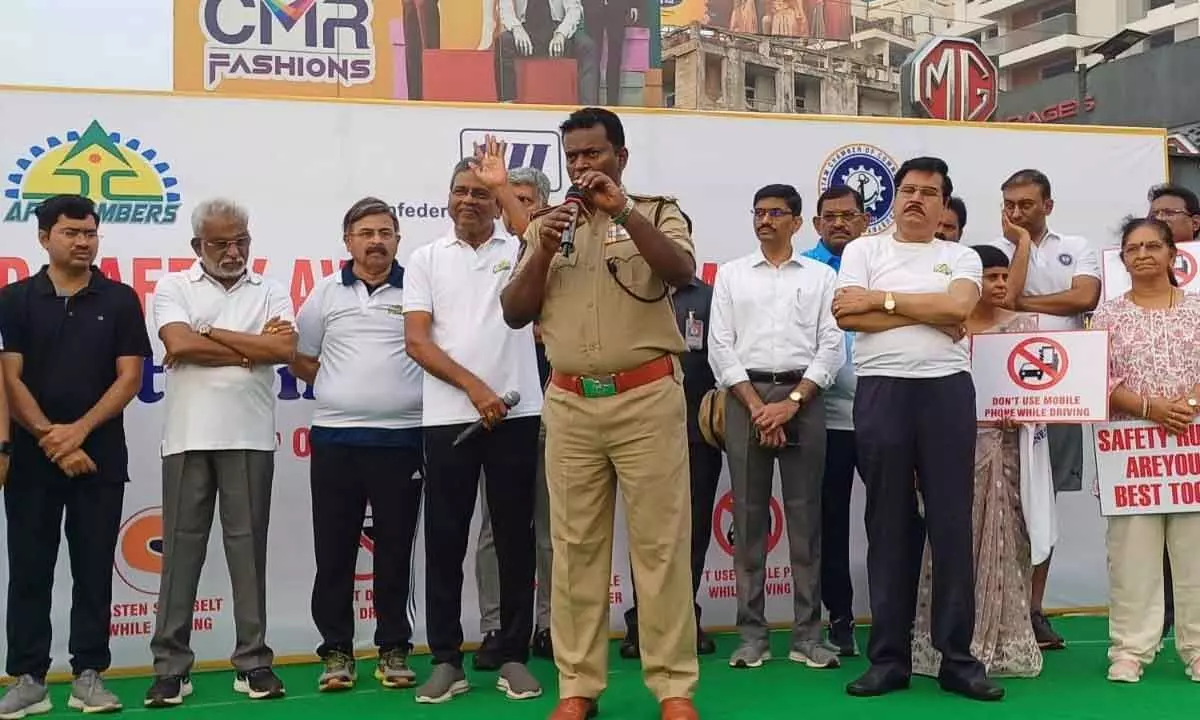 Police Commissioner A Ravi Shankar among others creating awareness about road safety in Visakhapatnam on Sunday