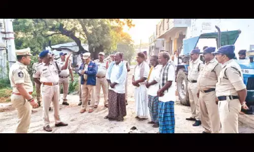 Superintendent of Police K K N Anburajan conducting visible policing in villages in Anantapur district on Sunday