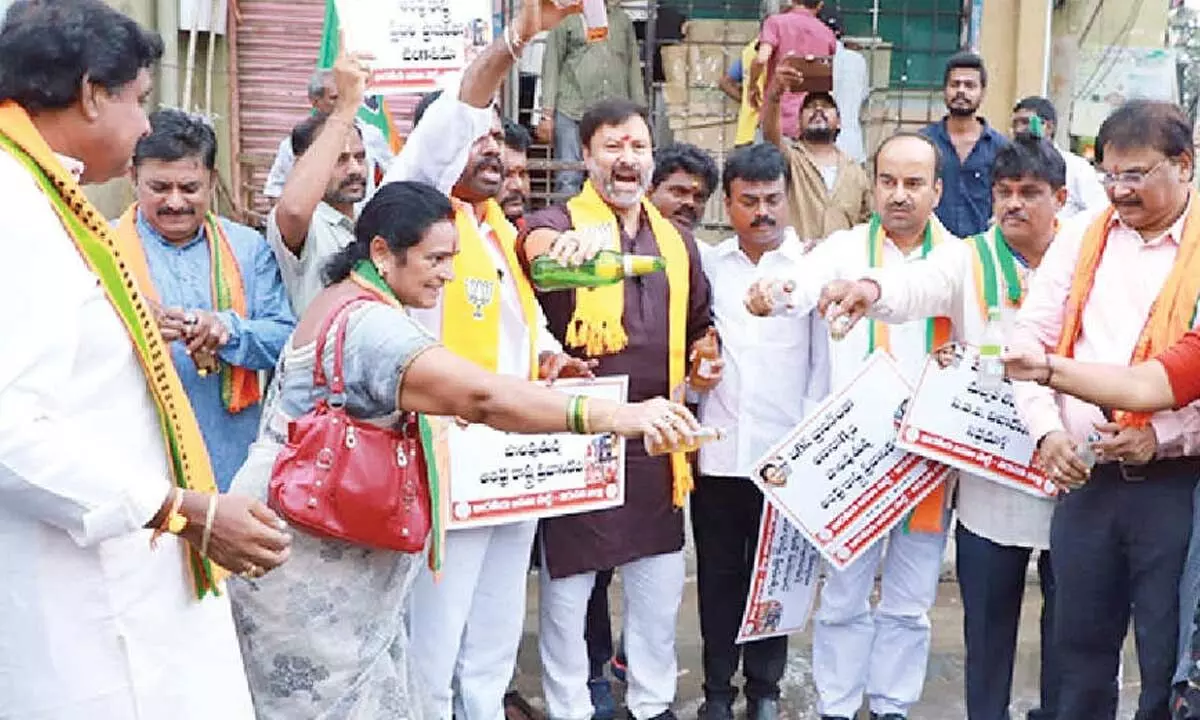 BJP leaders G Bhanuprakash Reddy, Samanchi Srinivas and others taking part in the protest in Tirupati on Monday.