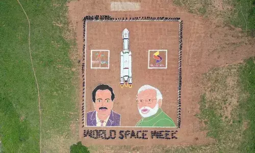Pictures of Prime Minister Narendra Modi, ISRO Chairman Somnath and rocket models made by the students on the premises of Sri Shirdi Sai Junior College in Rajahmundry on Monday