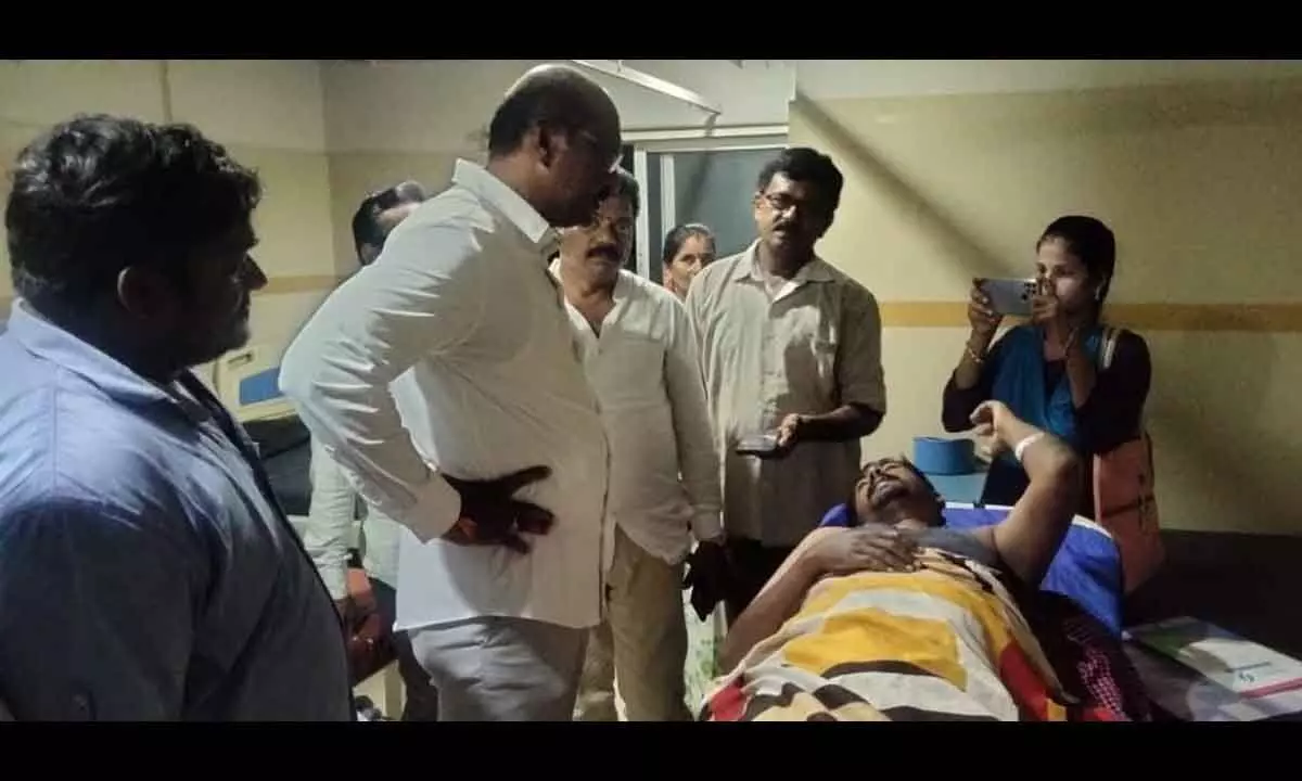 Visakhapatnam West MLA PGVR Naidu (Ganababu) interacting with a victim at a private hospital in Visakhapatnam on Tuesday