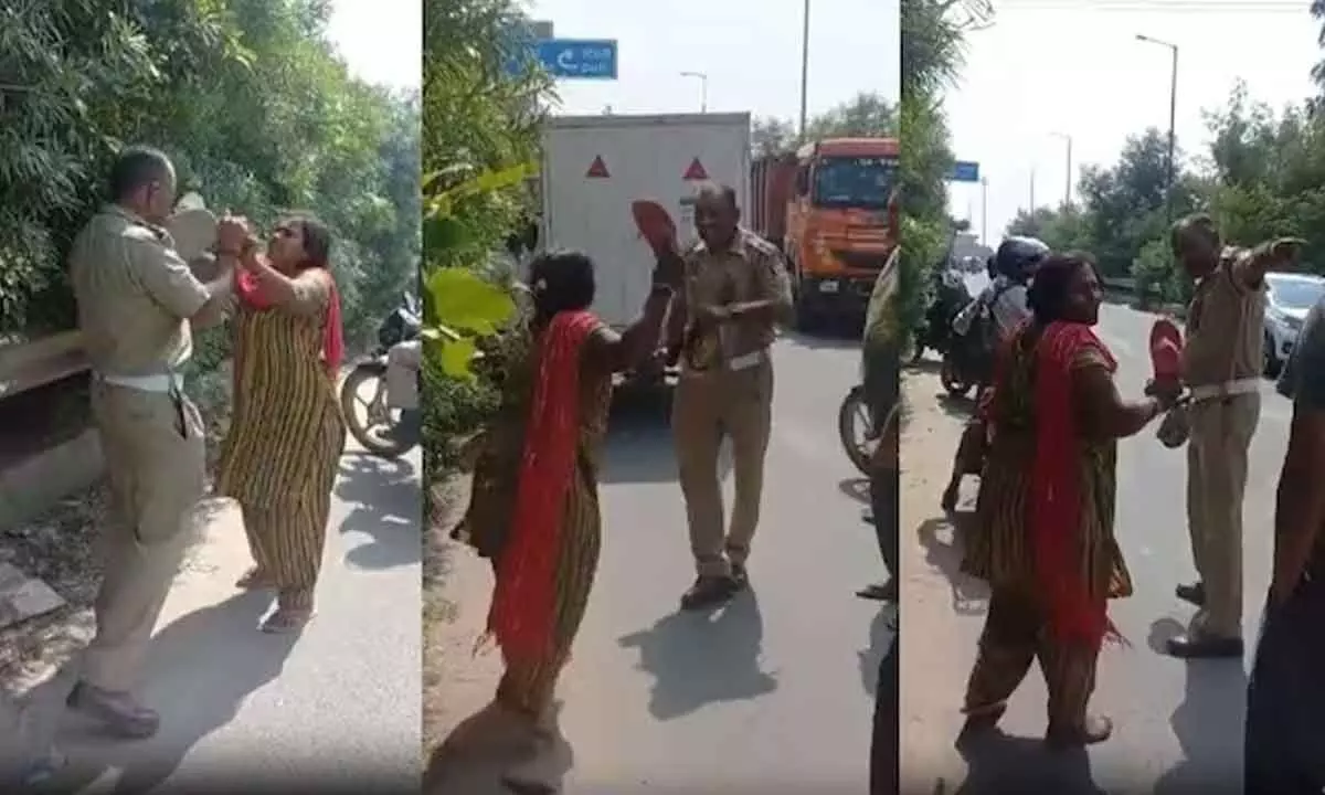 Viral Video Shows Woman E-Rickshaw Driver Assaulting Traffic Cop In Ghaziabads Indirapuram