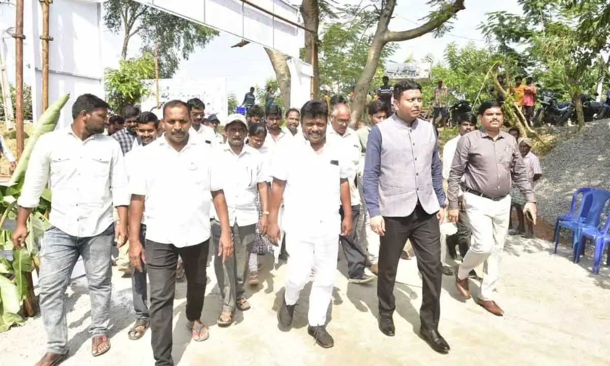District Collector Nishanth Kumar and MLA A Joga Rao visiting Jagananna colony at Krishnapalli in Parvathipuram mandal on Thursday