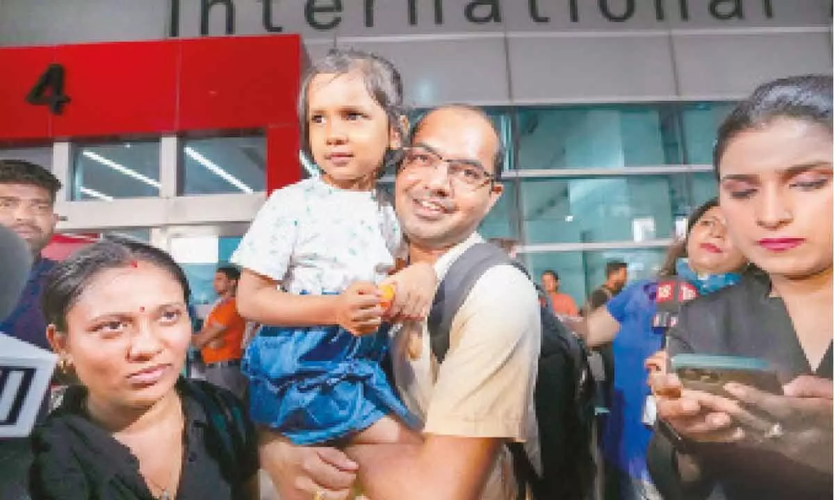 Indian nationals evacuated from Israel under Operation Ajay arrive at Indira Gandhi International airport, in New Delhi on Friday