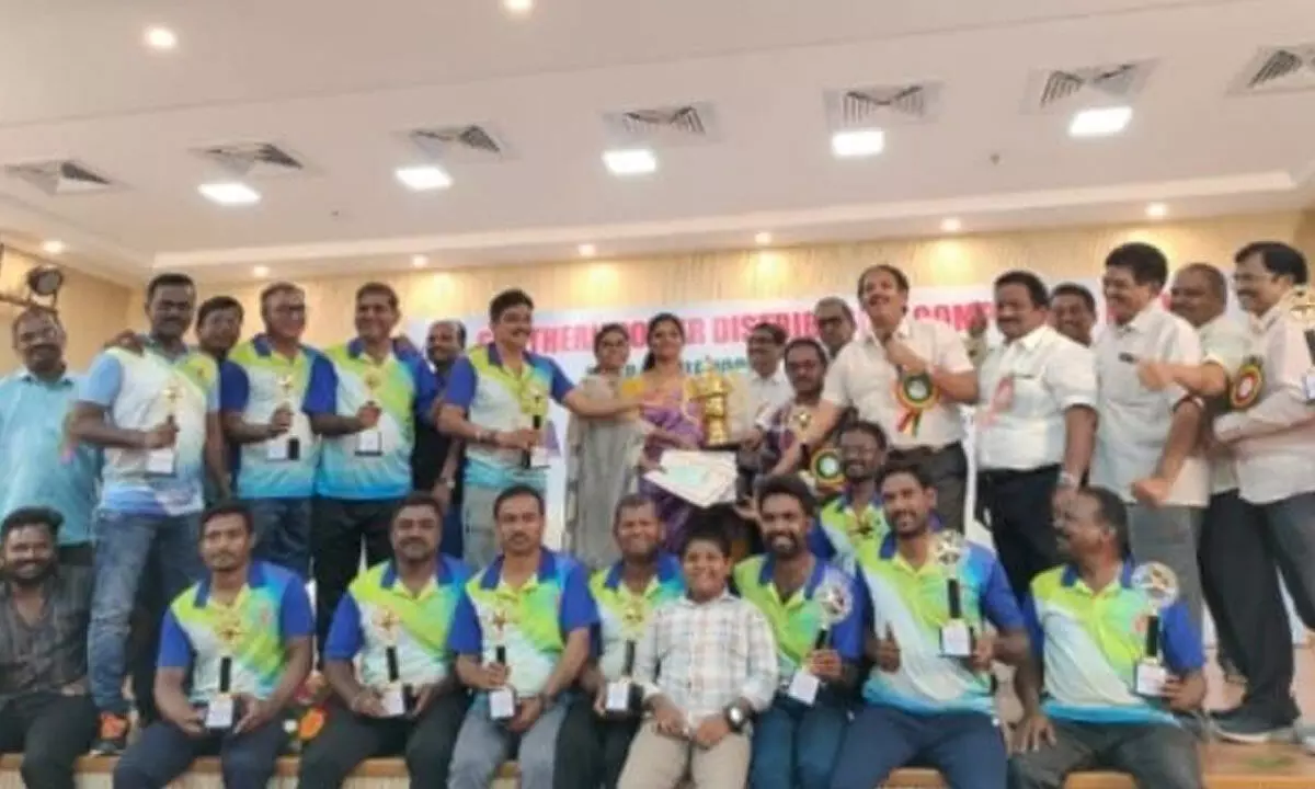 SPDCL Tirupati circle hockey team, which won the hockey competition in the inter-circle employees sports meet, with the cup in Tirupati on Monday.