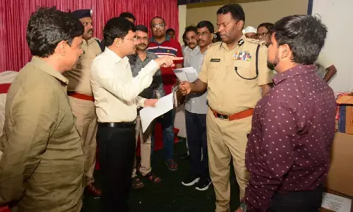 District Collector A Mallikarjuna along with Police Commissioner A Ravi Shankar examining EVM godown in Visakhapatnam on Sunday