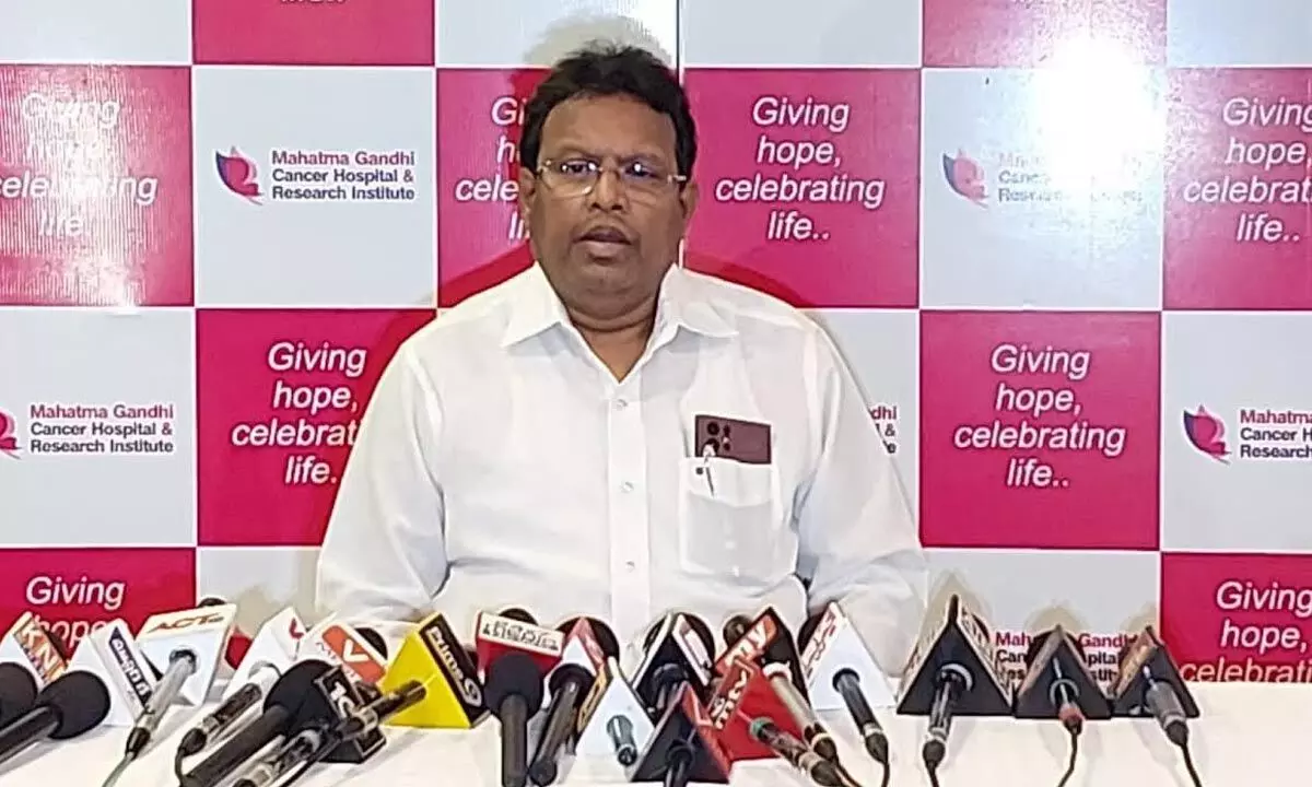 Surgical oncologist and managing director of Mahatma Gandhi Cancer Hospital and Research Institute Dr V Muralikrishna speaking at the media conference in Visakhapatnam on Tuesday