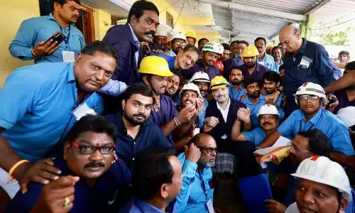 Rahul Gandhi interacts with coal mine workers at Peddapally in Telangana