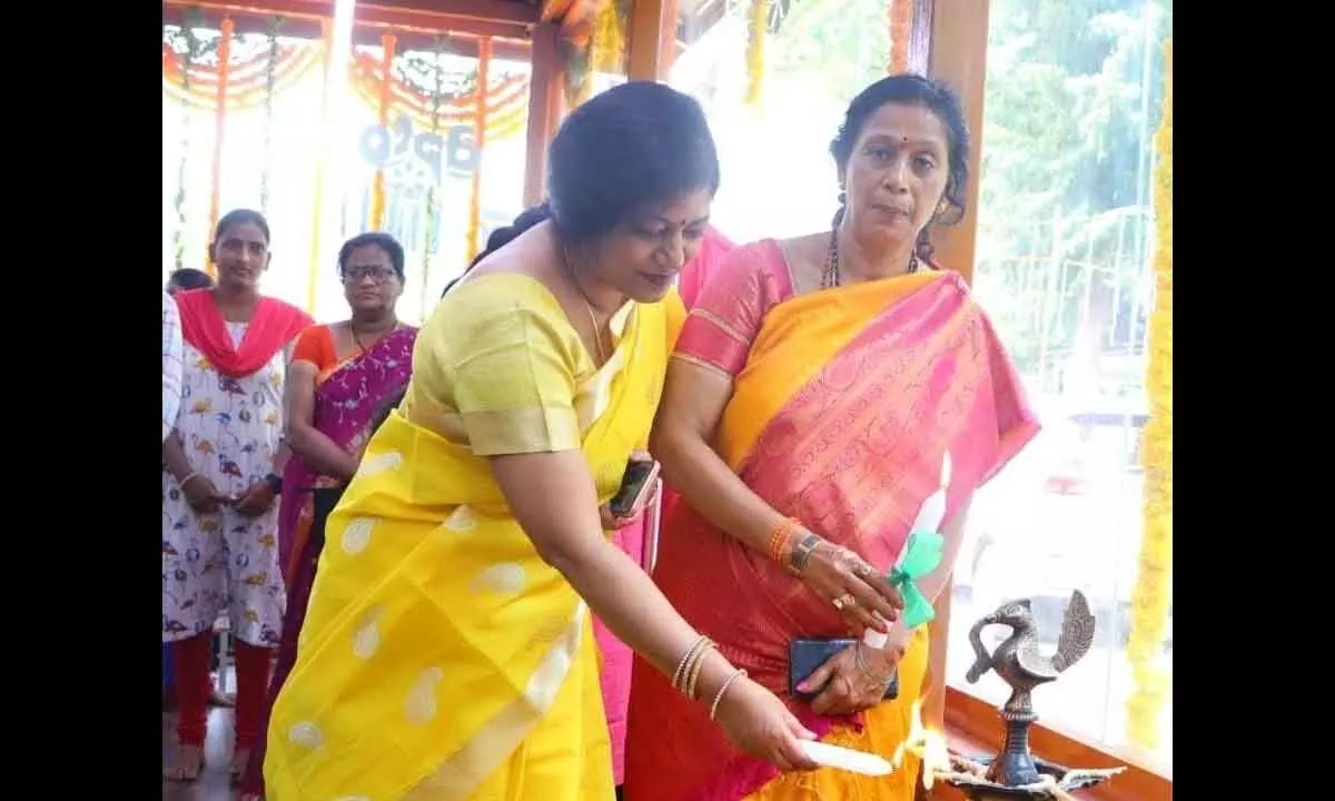 Principal Secretary, Handloom and Textiles, K Sunita with commissioner of Archaeology Dr Vani Mohan  lighting the lamp in Bapu Museum on Thursday