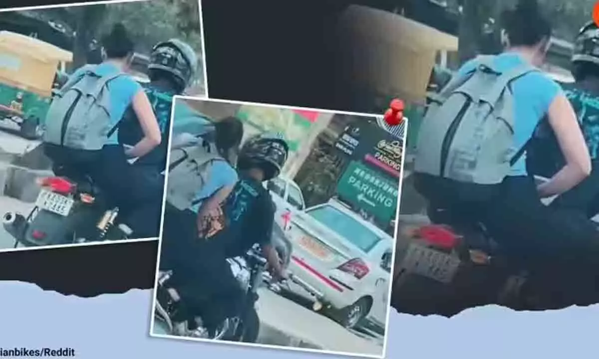 Viral Video Of Woman Working On Laptop While Riding Pillion