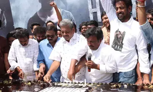 Grand Pan India Star Prabhas Birthday Celebrations in the presence of fans by unveiling Huge Cut Out