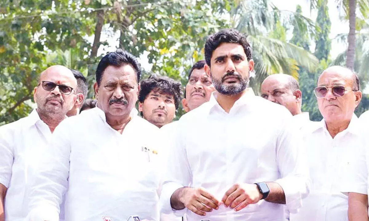 TDP national general secretary Nara Lokesh addresses media after visiting his father N Chandrababu Naidu, in Rajamahendravaram on Saturday. Former ministers and other party leaders are also seen.