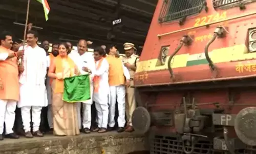 Purandeswari flags of special train carrying AP soil for Amrutavanam in Delhi