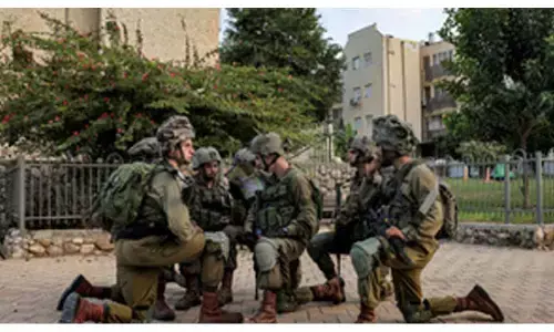 Palestinian gunmen clash with Israeli troops in Gaza