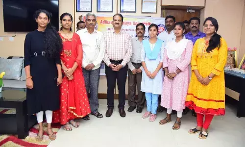 AKNU Vice-Chancellor K Padma Raju with the students selected for West Zone NSS Pre-Republic Day Parade Camp, in Rajamahendravaram on Monday