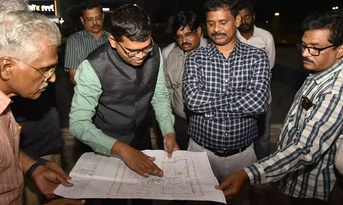 Collector S Dilli Rao and VMC Commissioner Swapnil Dinakar Pundkar inspects works at Swaraj Maidan in Vijayawada on Tuesday