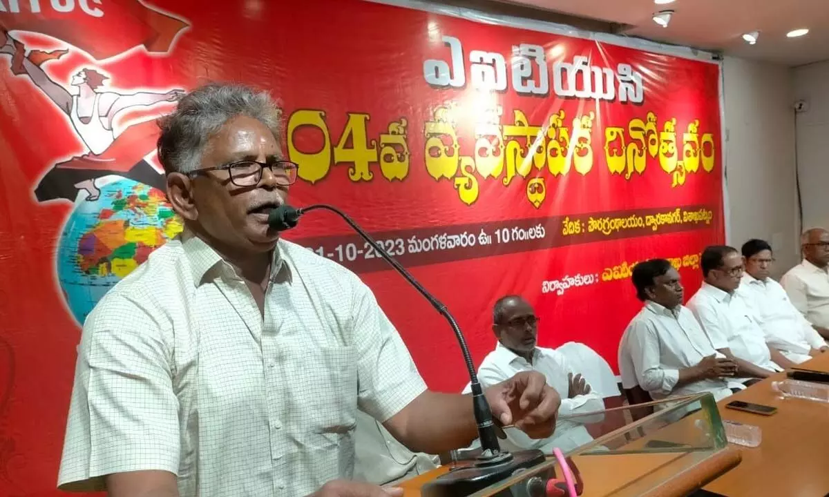 AITUC State working president Chalasani Rama Rao speaking at  a meeting organised on the occasion of the 104th Foundation Day of AITUC in Visakhapatnam on Tuesday