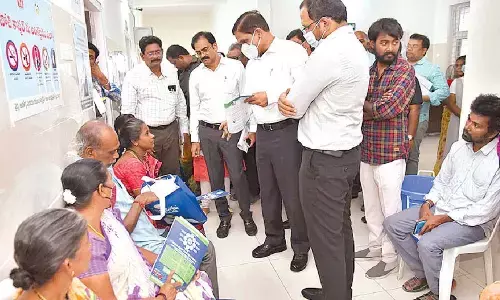 Special Chief Secretary M T Krishna Babu, Family Welfare Commissioner J Nivas, Dr YSR Aarogyasri CEO Harendra Prasad, district Collector M Venugopal Reddy visiting Aarogya Suraksha health camp in Mangalagiri on Tuesday