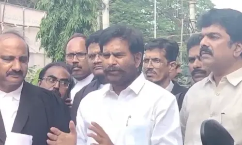 Senior TDP leader Devineni Uma Maheswara Rao speaking to the media near the ACB court in Vijayawada on Tuesday