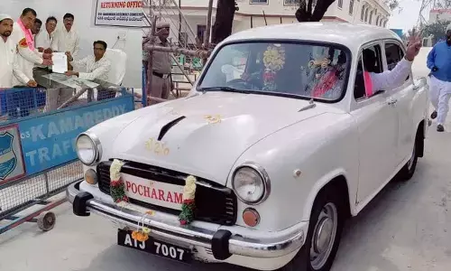Pocharam goes in Ambassador car to file nomination papers