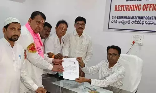 Banswada: Pocharam Srinivas Reddy goes in Ambassador car to file nomination papers