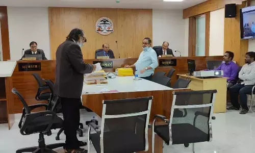 APERC chairman Justice C V Nagarjuna Reddy holding a public hearing at the APEPDCL office in Visakhapatnam on Saturday