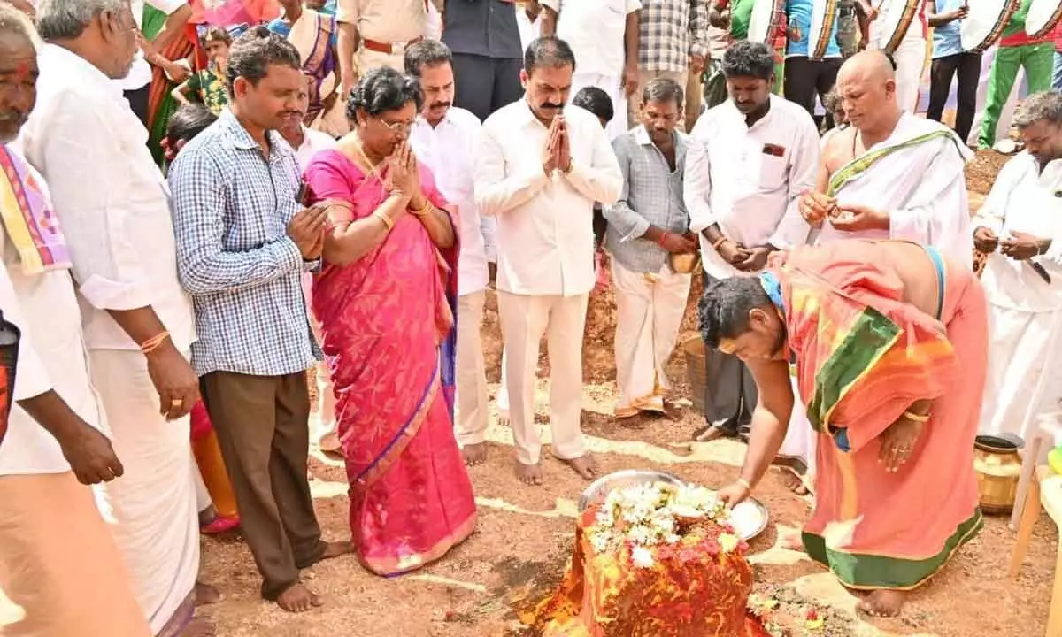 Agriculture Minister Kakani Govardhan Reddy laying foundation stone for the construction of a temple at Nandivayee village on Sunday
