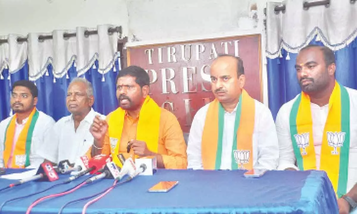 BJP spokesperson Samanchi Srinivas speaking to the media in Tirupati on Sunday. Party leader K Ajay Kumar is also seen.