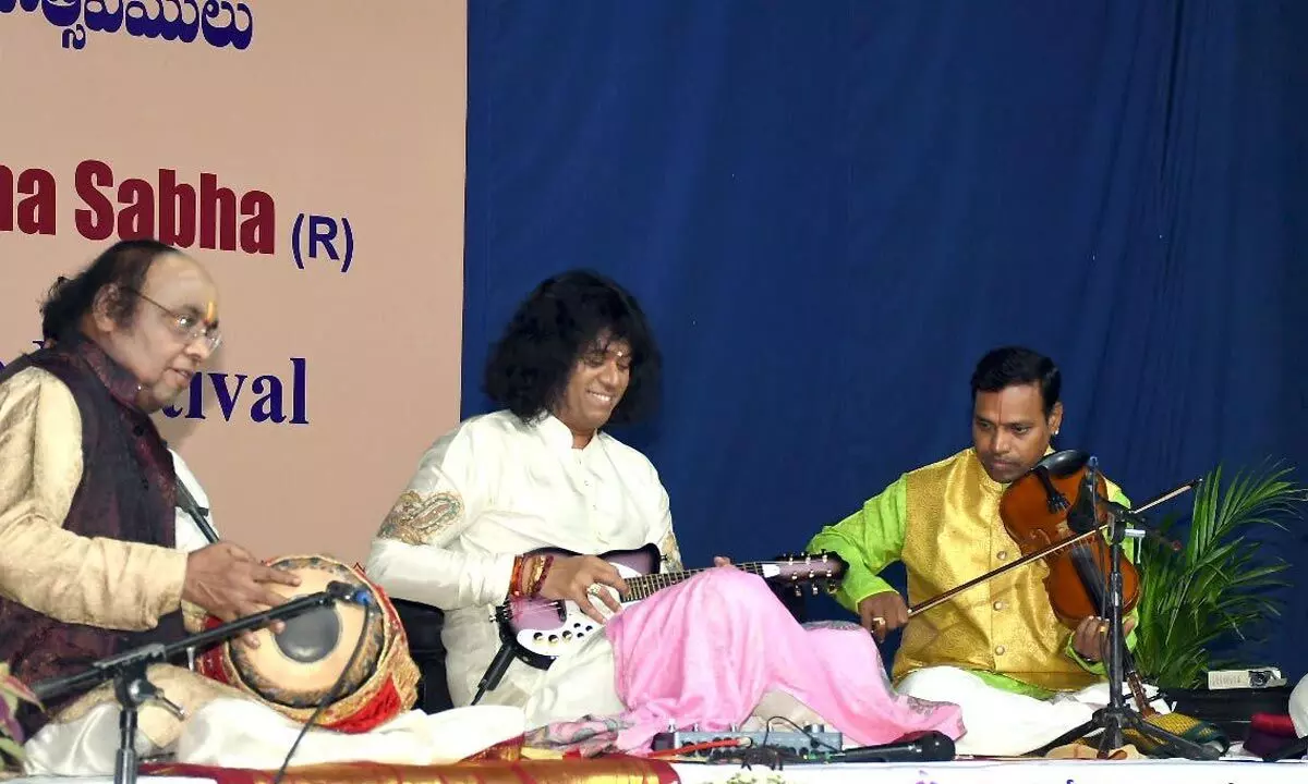 Classical musician Yella Venkateswara Rao and Mandolin player Uppalapu Rajesh, other artistes performing at annual music festival at Ghantasala Venkateswara Rao Music and Dance College in Vijayawada on Monday			Photo: Ch Venkata Mastan