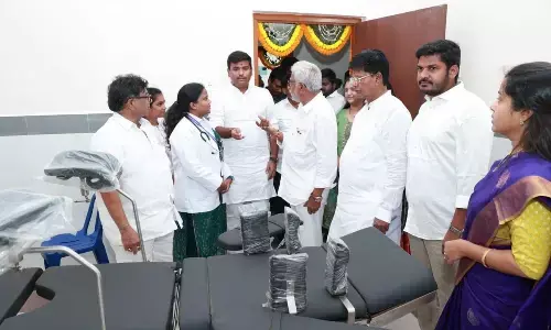 IT minister Gudivada Amarnath interacting with doctors at the YSR Urban Primary Health Centre in Visakhapatnam on Monday