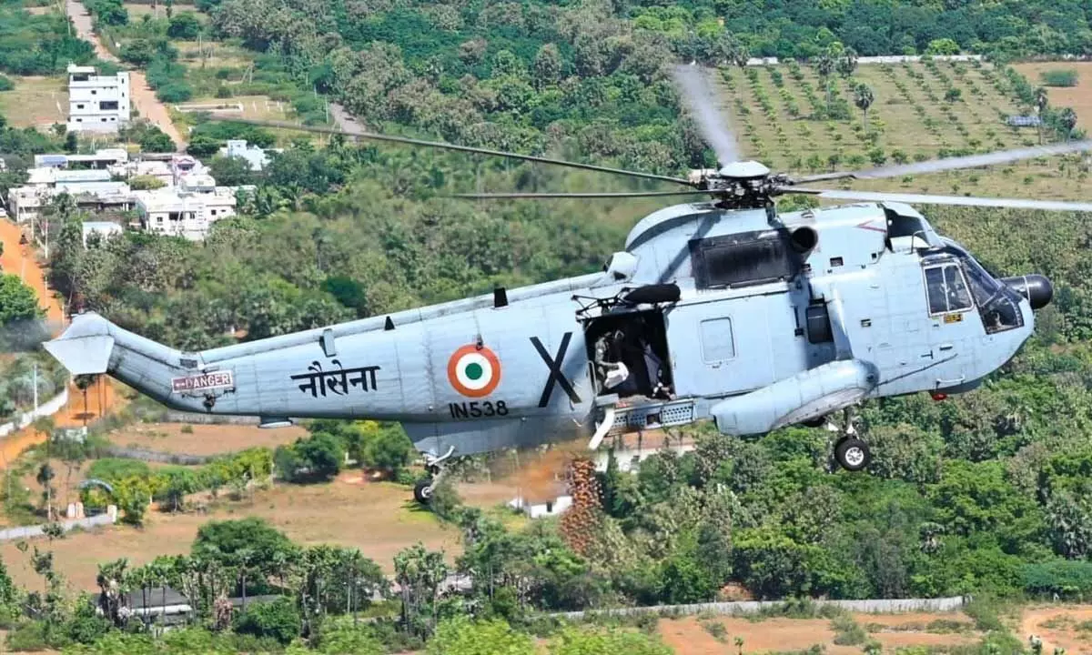 Aerial seeding exercise carried out by the Indian Navy helicopter in Visakhapatnam