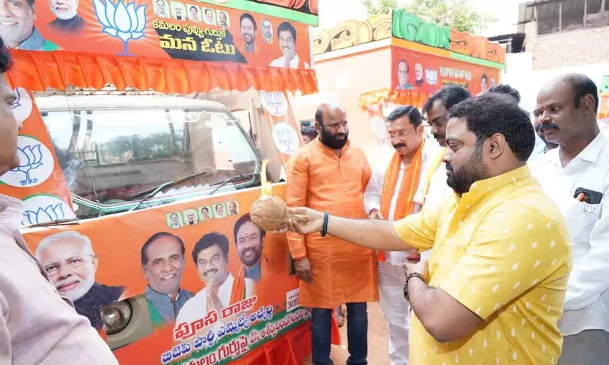 Musheerabad BJP candidate performs Pooja to Election campaign vehicles