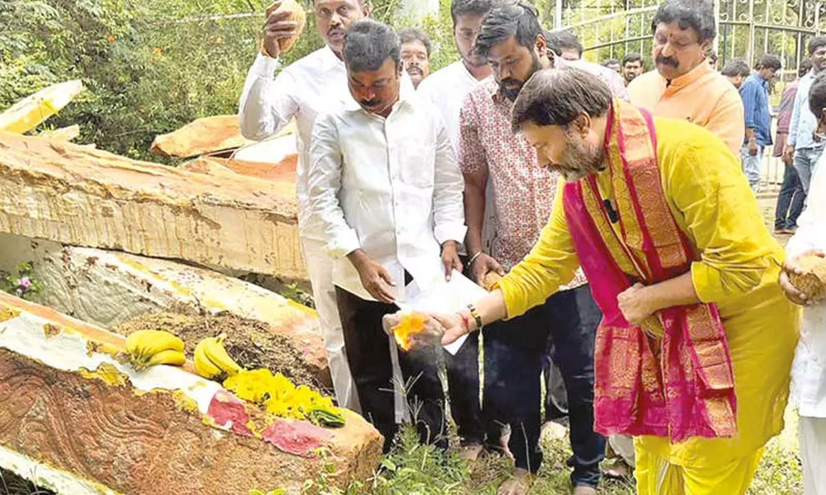 BJP State spokesperson G Bhanu Prakash Reddy performing puja to the removed pillars of ancient Parveta Mandapam at Tirumala on Tuesday