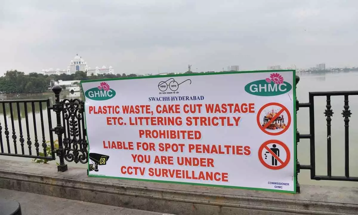 GHMC places eight boards on Tank Bund banning cake cutting