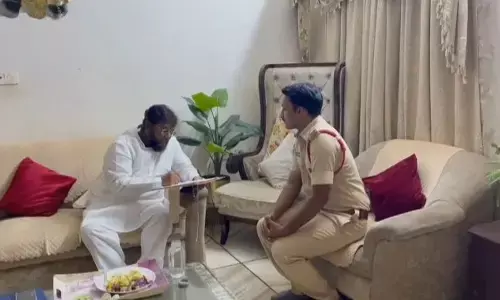 Police serving notice to TDP Nellore district president and former  Nellore mayor Shaik Abdul Aziz at his residence in Nellore on Tuesday