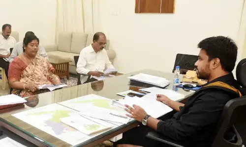 Collector Prasanna Venkatesh addressing a meeting in Eluru on Tuesday