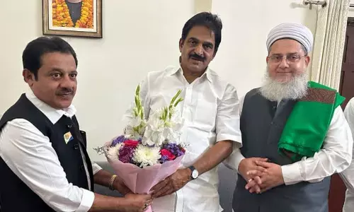 Telangana polls: Karnataka Minister Zameer Ahmed Khan discusses with KV Venugopal