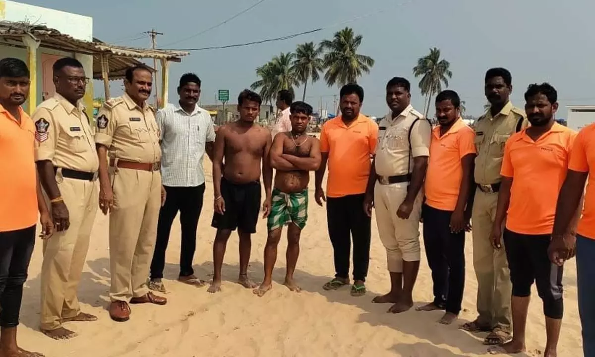 Marine police and swimmers along with Siba Raut at  Suryalanka beach on Sunday