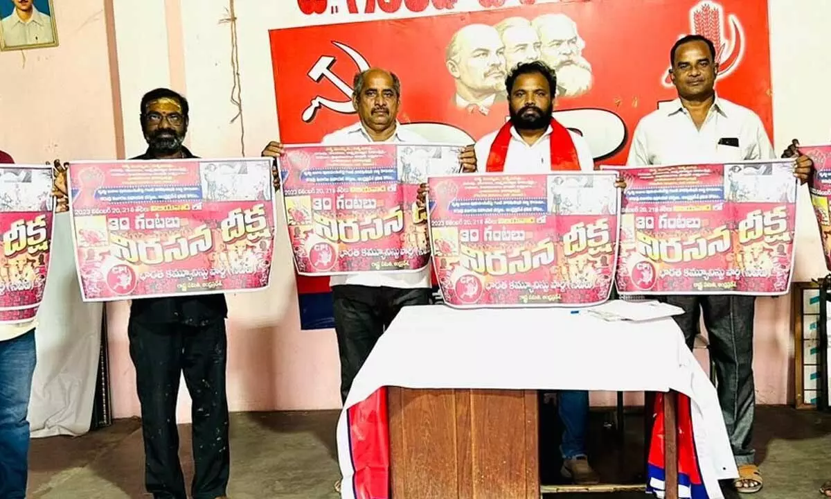 CPI district secretary Tatipaka Madhu and other leaders releasing posters of a protest at the party office in Rajamahendravaram  on Monday