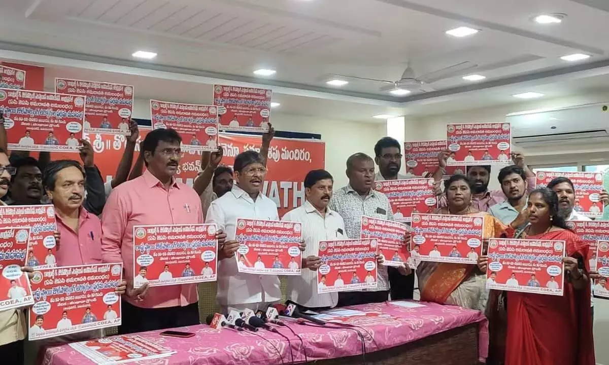 AP JAC, Amaravati, and Contract, Outsourced Employees’ Association leaders release posters on state-level meet at the Revenue Bhavan in Vijayawada on Tuesday