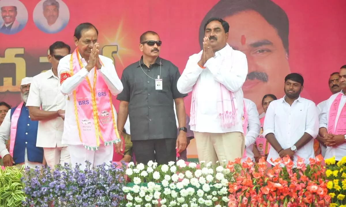 Chief Minister K Chadnrasekhar Rao and Minister for Panchayat Raj and Rural Development Errabelli Dayakar Rao greet people at the Praja Ashirvada Sabha at Thorrur on Tuesday