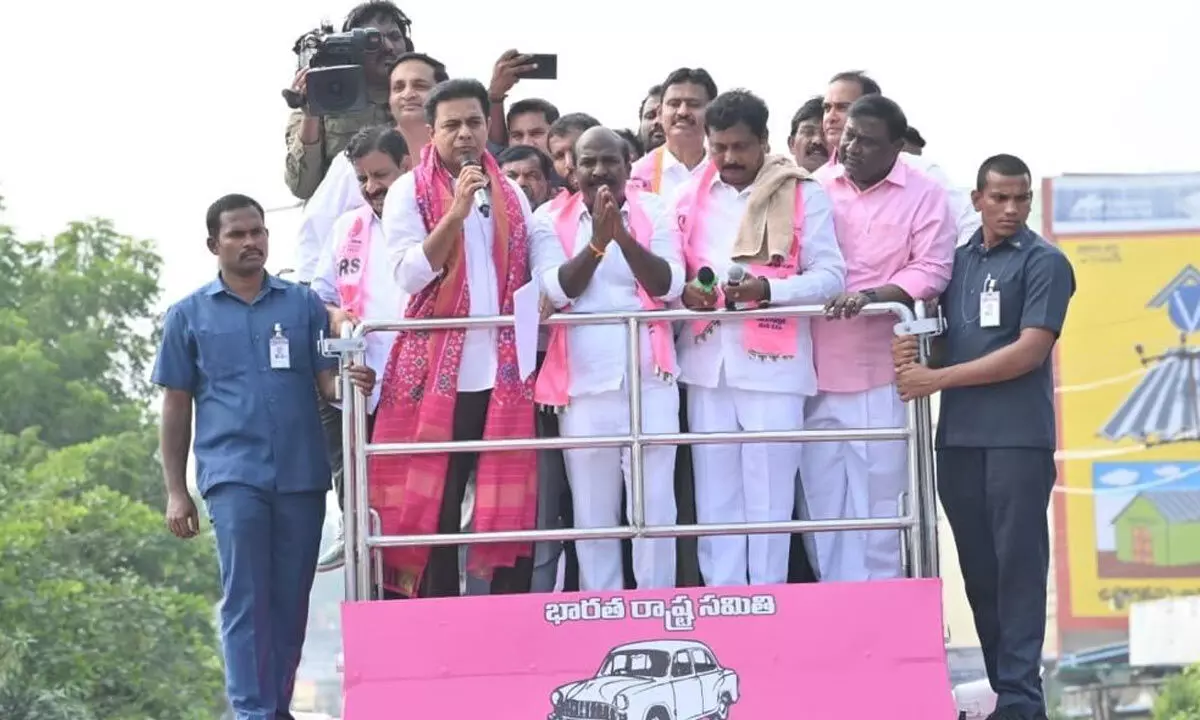 IT Minister and BRS working president, KTR along with sitting MLA for Nakrekal addressing the huge gathering at a road show in Chityal on Tuesday
