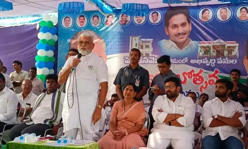 Minister Ambati Rambabu addressing a meeting at Penkametta village on Tuesday. Home Minister Taneti Vanitha, MLA Jakkampudi Raja, MP Bharat Ram and others are also seen.
