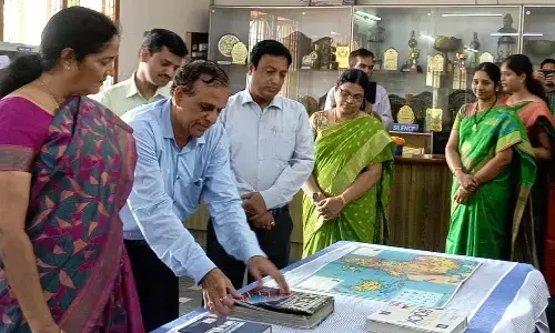 KCP Siddhartha Adarsh Residential Public School Convenor Veerpaneni Sasikala along with Principal and others at Book Exhibition at Kanuru on Tuesday