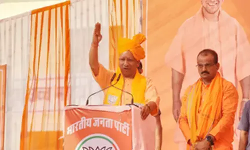 Whenever disaster hits, some people run away to Italy: Yogi hits out at Gandhis in Raj