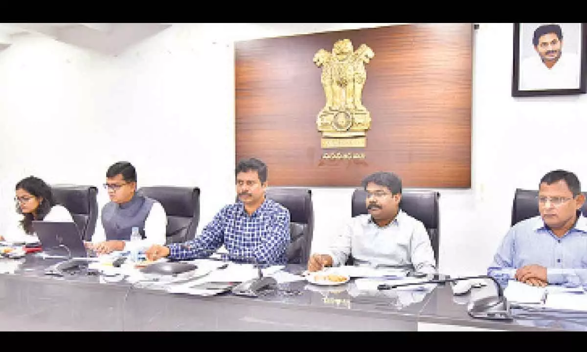NTR district collector S Dilli Rao participating in a video conference from his office in Vijayawada on Thursday